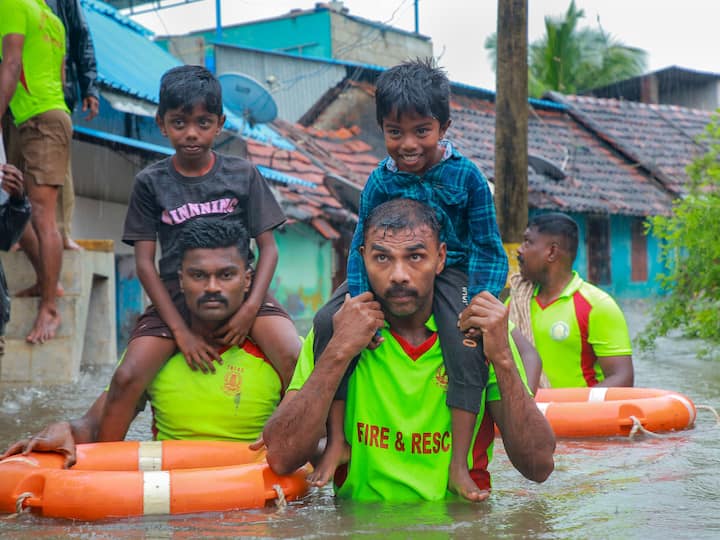 Tamil Nadu Fire and Rescue Services personnel were also seen rescuing children from a flooded area after heavy rain, in Kanyakumari district. (Image Source: PTI)