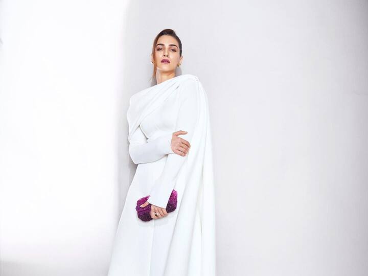 Kriti Sanon exuded minimal fashion vibes while donning a chic white outfit and a striking purple lip color.