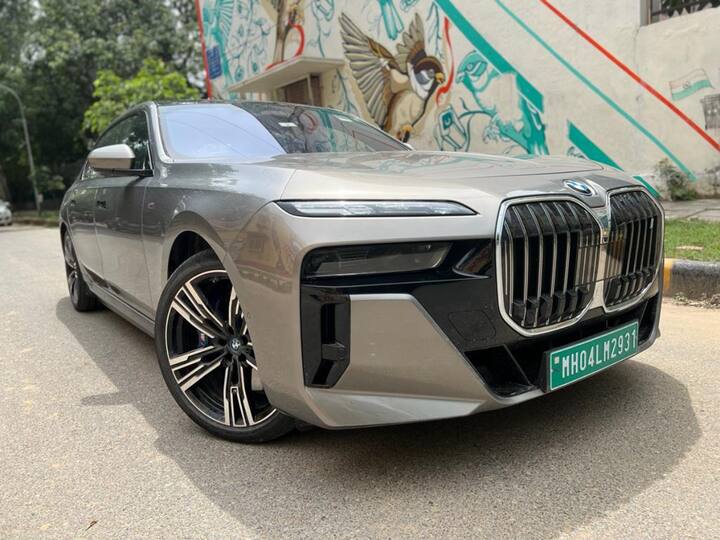 BMW i7 — The i7 represents the transition of the 7 Series into the electric realm, serving as BMW's flagship in this new domain. Its styling, complete with the signature massive grille, is awe-inspiring, complemented by illuminating effects and meticulous detailing throughout. This mammoth luxury vehicle runs on a battery instead of an engine, offering an impressive range of 625km, more than sufficient for a car of its luxury stature. Moreover, it even features a substantial 31.3-inch TV at the back!