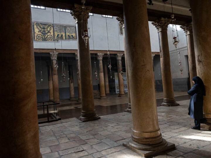 Bethlehem is normally at its busiest during the Christmas season, but this year's war has scared away tourists and pilgrims, leaving hotels, restaurants, and souvenir shops deserted. (Image Source: Getty Images)