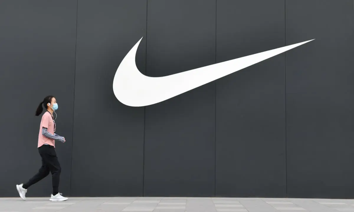 Nike Layoffs 2023 to cut hundreds of jobs in new year will cost cutting 2 billion dollars business marathi news Nike Layoff: नवीन वर्षात 'नाईकी' देणार कर्माचाऱ्यांना मोठा धक्का, शेकडो कर्मचाऱ्यांना नारळ देण्याची तयारी 