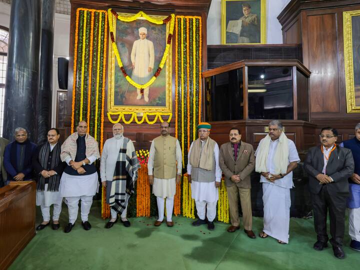 Prime Minister Narendra Modi, Lok Sabha Speaker Om Birla, Union Ministers Rajnath Singh and Arjun Ram Meghwal, BJP National President JP Nadda and others after paying tribute to Pandit Madan Mohan Malaviya on his birth anniversary, at the Central Hall of Samvidhan Sadan, in New Delhi. (Image Source: PTI)