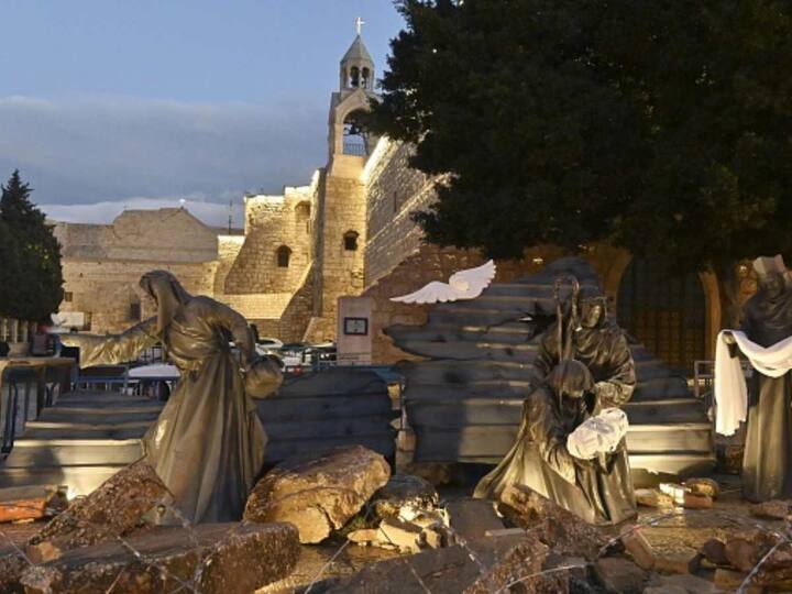 A poignant representation of this solidarity is the Holy Family Cave sculpture, portraying a bleak version of the traditional nativity scene. (Image Source: Getty Images)