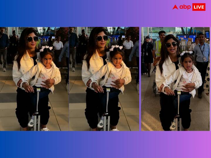 Shilpa Shetty suitcase ride with daughter at airport Video goes viral on social media Video: एयरपोर्ट पर सूटकेस राइड के मजे लेती दिखीं शिल्पा शेट्टी, ट्विनिंग कपड़ों में बेटी के साथ एक्ट्रेस का क्यूट वीडियो हुआ वायरल