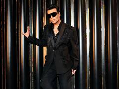 Karan Johar Looks Suave In Black Suit; Shares BTS From Latest Episode Of KWK