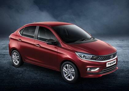 तगड़े बूट स्पेस वाली अगली कार टाटा टिगोर है, जिसे आप 419 लीटर बूट स्पेस के साथ घर ला सकते हैं. इसके अलावा ये कार GNCAP में 4 स्टार सेफ्टी रेटिंग के साथ उपलब्ध है, साथ ही इसे पेट्रोल और सीएनजी ऑप्शन के साथ इलेक्ट्रिक वेरिएंट में भी घर लाया जा सकता है.