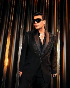 Karan Johar Looks Suave In Black Suit; Shares BTS From Latest Episode Of KWK