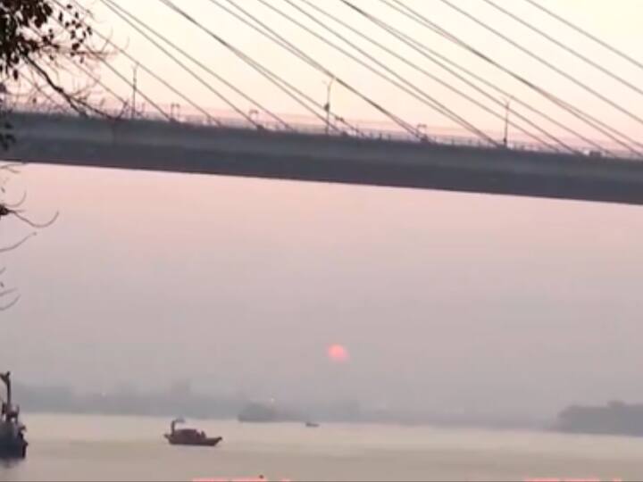 People of Kolkata enjoying a boat ride along the Ganges as they witness the last sunset of 2023. (Image Source:PTI)