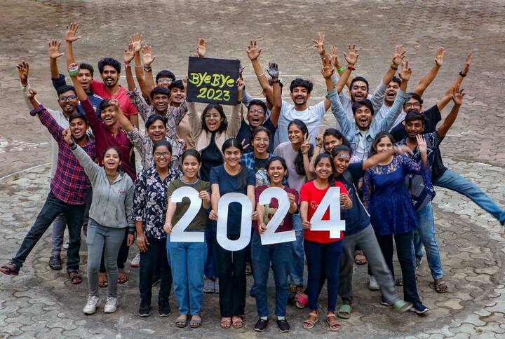 Youngsters pose for photos as they prepare to welcome the New Year 2024, in Nagpur. (Image Source: PTI)