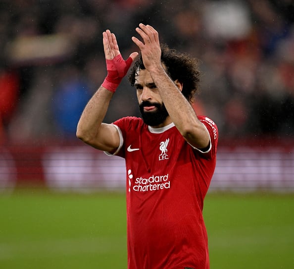 Liverpool secured a 4-2 victory over Newcastle United, propelled by Mohamed Salah's brilliance in the second half.