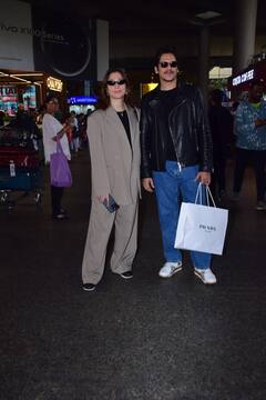 नए साल का जश्न मनाने के बाद स्टाइलिश अंदाज में लौटे Tamannaah-Vijay, एयरपोर्ट पर एक दूसरे का हाथ थामे स्पॉट हुए लव बर्ड्स