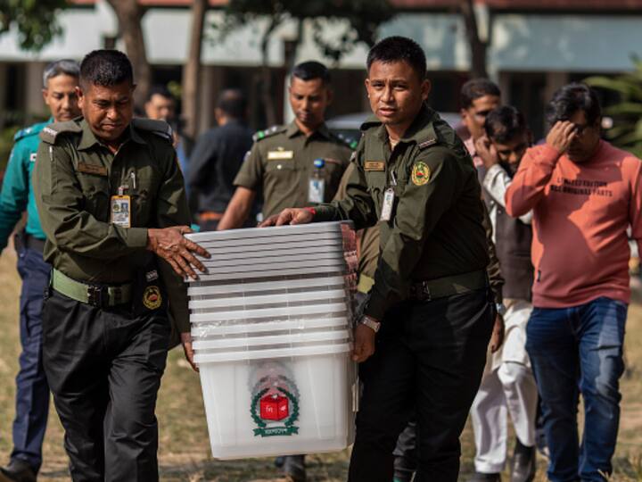 Security officers were seen carrying ballot boxes earlier on Saturday for distribution ahead of the 2024 Bangladeshi general election. (Image Source: Getty)