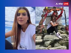 Nia Sharma Photos: माथे पर चंदन का तिलक लगाए भोलेनाथ के दर्शन करने पहुंचीं निया शर्मा, पहाड़ों पर यूं दिए खूबसूरत पोज