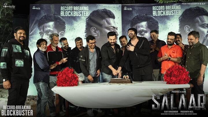 In one of the photos, Prabhas and Prithviraj can be seen cutting the cake.