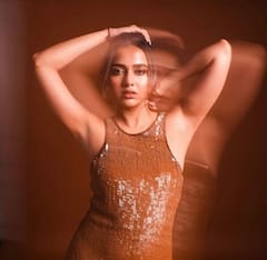 Tejasswi Prakash Shows Off Her Passion For Cutouts In A Brown Midi Dress; PICS
