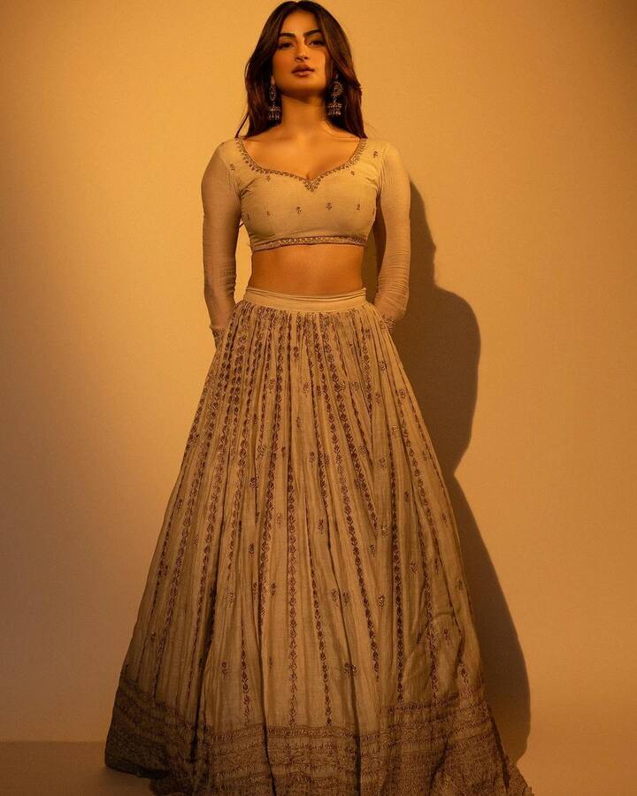 Palak Tiwari attracted fans in a pastel-hued lehenga with intricate needlework.