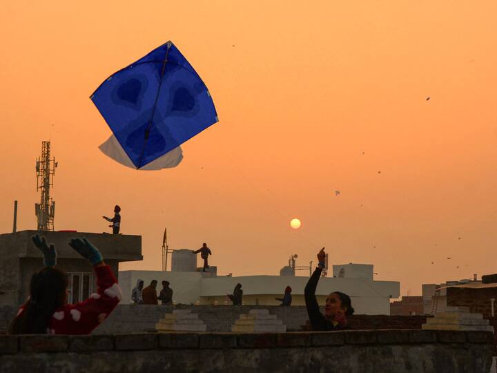 In addition, colourful kites decorate the sky during Lohri festival, in Amritsar. (Image Source: PTI)