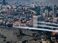 IAF's Suryakiran Aerobatic Team Leaves Mumbaikars In Awe During Air Show 2024 Rehearsal — IN PICS