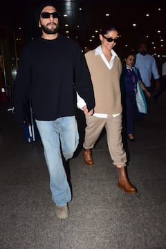 Pics: સ્ટાઇલિશ અંદાજમાં એરપોર્ટ પર સ્પૉટ થયા દીપિકા-રણવીર