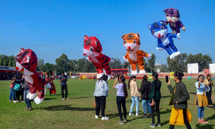 Young women participate in the kite festival organised to celebrate Makar Sankranti festival, at Motilal Nehru Police Stadium in Bhopal. (Image Source: PTI)