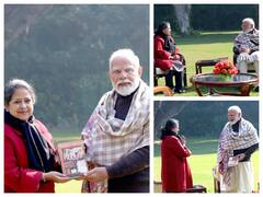 Pranab Mukherjee's Daughter Presents A Copy Of Her Book To PM Modi. IN PICS
