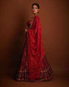 Malavika Mohanan Looks Stunning In Red Lehenga; Check Out Pics