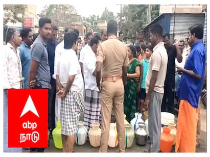 Mayiladuthurai People who blocked the road with empty jugs for water - TNN கோடை துவங்கும் முன்பே மயிலாடுதுறையில் தண்ணீர் பஞ்சம் - தண்ணீர் கேட்டு சாலைமறியல் செய்த பொதுமக்கள்