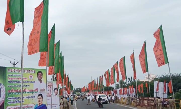 PM Modi visit Rameswaram Party flags all over the roa .BJP ready to welcome Modi - TNN சாலை முழுவதும் கட்சிக் கொடிகள்..! விண்ணைப் பிளக்கும் ஜெய்ஸ்ரீராம் கோசம்.. மோடியை வரவேற்கத் தயாரான பாஜகவினர்..!