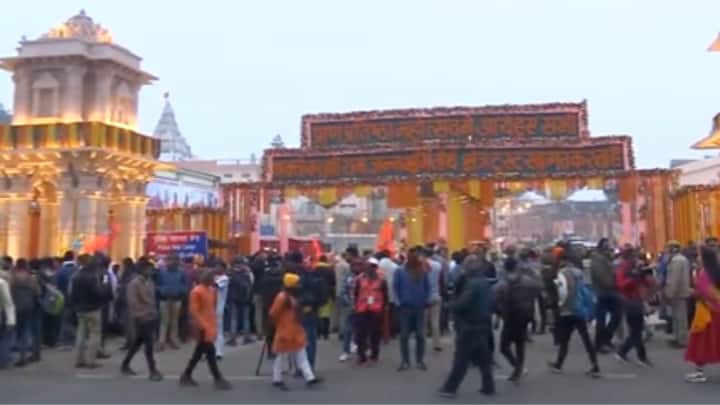 Devotees in Ayodhya were seen standing outside the temple gates waiting to enter as the consecration ceremony is about to begin in just a few hours. (Image Source: X/@ANI)