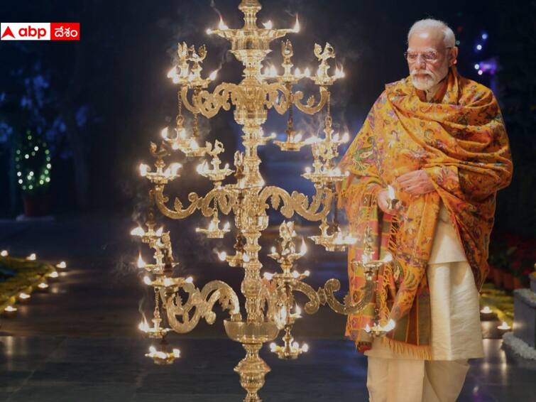 PM Modi celebrates Ram Temple Pran Pratishtha by lighting lamps దేశ వ్యాప్తంగా దీపావళి వాతావరణం, అయోధ్యలో సరయు తీరాన దీపోత్సవాలు