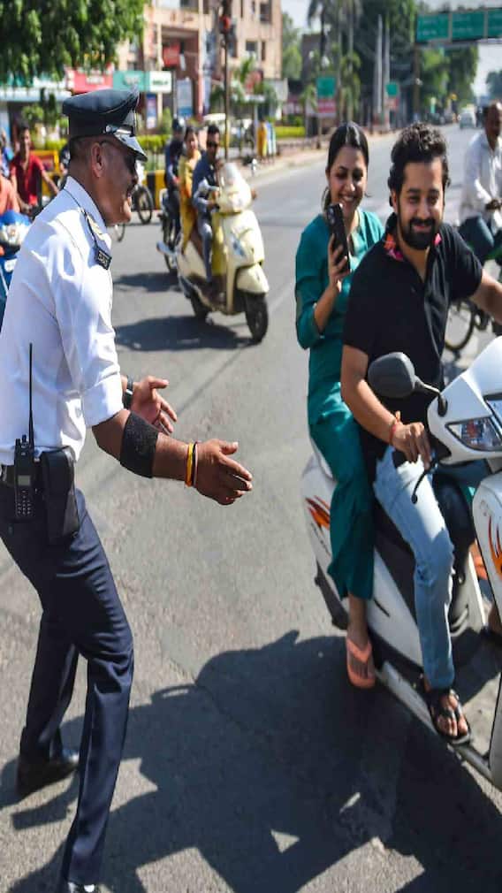 गाडी चालवताना 'या' गोष्टी केल्यास कधीच चालान कापलं जाणार नाही!