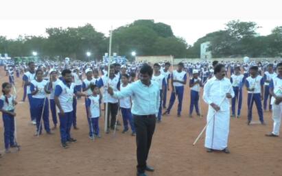 khelo Indian Games Trichy District Collector, Mayor played silambam - TNN கேலோ இந்திய விளையாட்டு போட்டி: திருச்சி மாவட்ட ஆட்சியர், மேயர் சிலம்பம் சுற்றி அசத்தல்