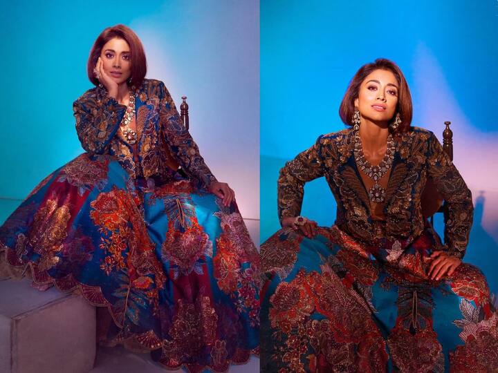 Shriya Saran Photos : வித்தியாசமான உடையில் அசத்தும் நடிகை ஸ்ரேயா சரணின் அழகிய புகைப்படங்களை இங்கே பார்க்கலாம்.