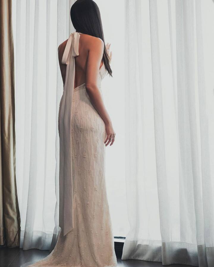 Karishma Tanna wore a backless bodycon white outfit from the house of designer duo Shantanu and Nikhil.