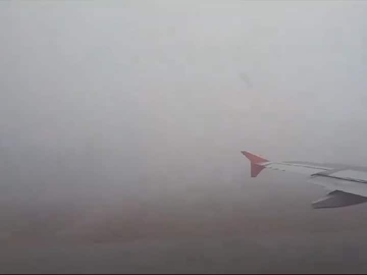 View from inside of a plane at Delhi’s IGI airport, flight operations are affected by a thick layer of fog. (Photo: ANI)