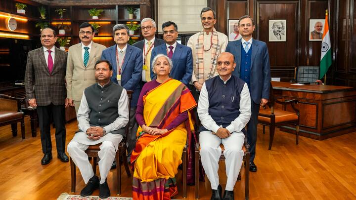 Union Finance Minister Nirmala Sitharaman with Ministers of State Pankaj Chaudhary and Bhagwat Karad and her team of officials a day before presentation of the Interim Budget 2024. (Image Source: PTI)