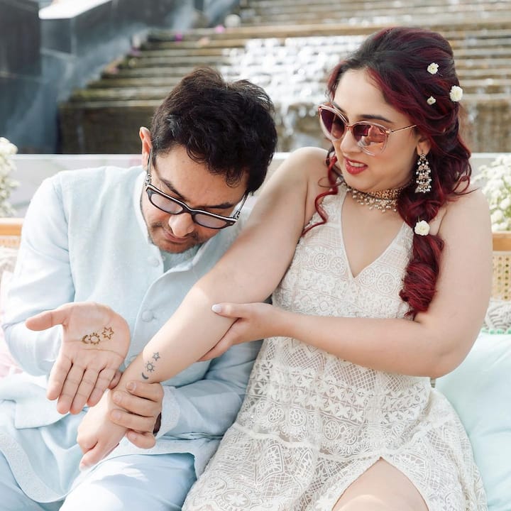 आयरा खान शादी के बाद लगातार अपने प्री-वेडिंग फंक्शन्स की अनसीन फोटोज शेयर कर रही हैं. हाल ही में उन्होंने अपनी मेहंदी से पापा आमिर के साथ कुछ अनदेखी तस्वीरें पोस्ट की हैं.