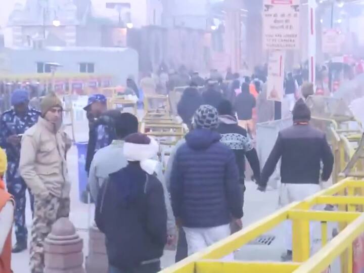 Devotees brave the cold morning and gather at Rampath for darshan of Ram Lalla at Shri Ram Janmabhoomi Temple in Ayodhya, Uttar Pradesh on Wednesday morning. (Photo: ANI)