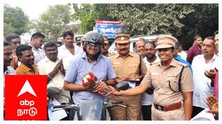 பைக்கில் வந்தவரை நிறுத்தி ஃப்ளவர் பொக்கே கொடுத்து பாராட்டிய எஸ்.பி! ஏன் தெரியுமா?