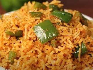 Capsicum Rice: சுவையான லஞ்ச் பாக்ஸ் ரெசிபி! குடைமிளகாய் சாதம் அசத்தலாக செய்வது இப்படித்தான்!