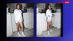 व्हाइट टीशर्ट के साथ डेनिम शॉर्ट्स और बूट्स पहने Nia Sharma लगीं बेहद ग्लैमरस, एक्ट्रेस की अदाओं ने बढ़ाई फैंस के दिलों की धड़कने