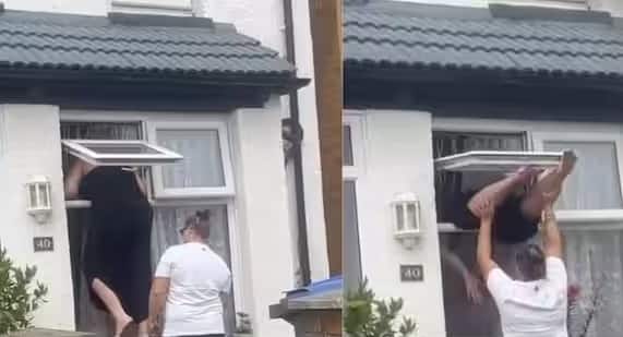 Woman Climbing Window Viral Video woman was entering her own house through the window you will not be able to stop laughing after watching viral video Woman Climbing Window Viral Video : स्वत:च्याच घरात खिडकीतून घुसत होती महिला; तेव्हाच झालं काही असं... व्हिडीओ पाहून हसू आवरणार नाही