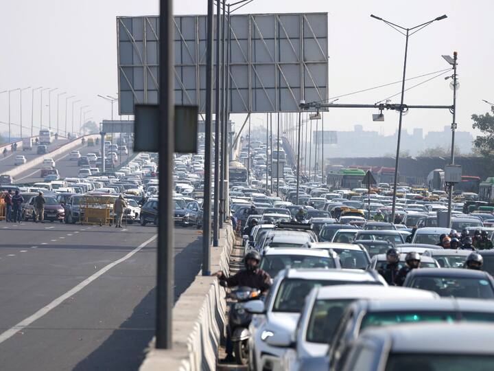 Vehicles stuck in a traffic jam at NH 24 due to a road closure ahead of farmers protest, in New Delhi. (Photo: PTI)