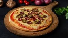 National Pizza Day 2024: Lip-Smacking Veg Pizzas To Try On This Day