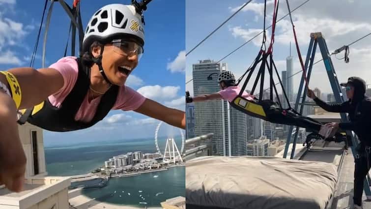 dangerous adventure by woman dubai marina worlds longest urban zipline shocking video लड़की ने ऊंची इमारत से जिपलाइन के सहारे किया स्लाइड, देखने वाले लोगों की अटकी रह गई सांसें