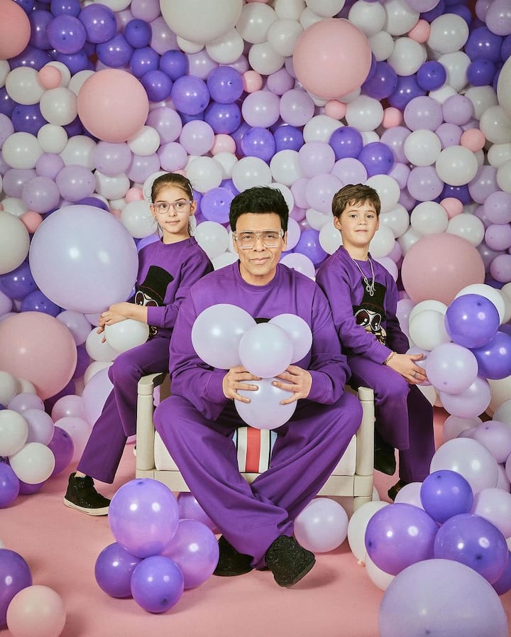 One of the charming photographs include the three of them holding balloons.