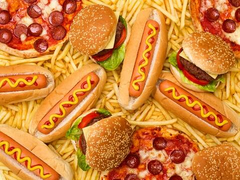 Remove Temptations : Keep unhealthy snacks out of sight and stock your kitchen with nutritious options. This makes it easier to make healthier choices when hunger strikes. (Image Source: Getty)