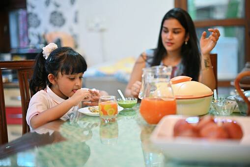 Plan Smart Indulgences:Allow yourself occasional treats, but plan them strategically. Enjoying your favourite foods in moderation as part of a balanced diet can help satisfy cravings without derailing your overall healthy eating goals. (Image Source: Getty)