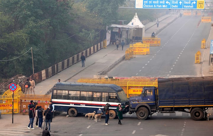 Security has been beefed up near the Singhu, Ghazipur, and Tikri borders to prevent farmers from staging a massive protest in Delhi tomorrow. (Source: PTI)