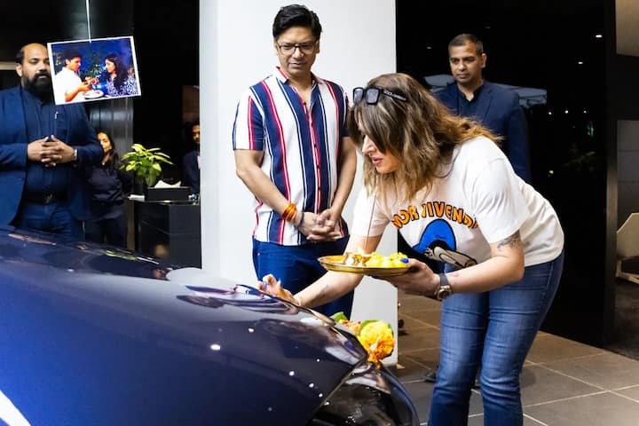 In the photos, Radhika can be seen doing customary pooja of the newly bought car.